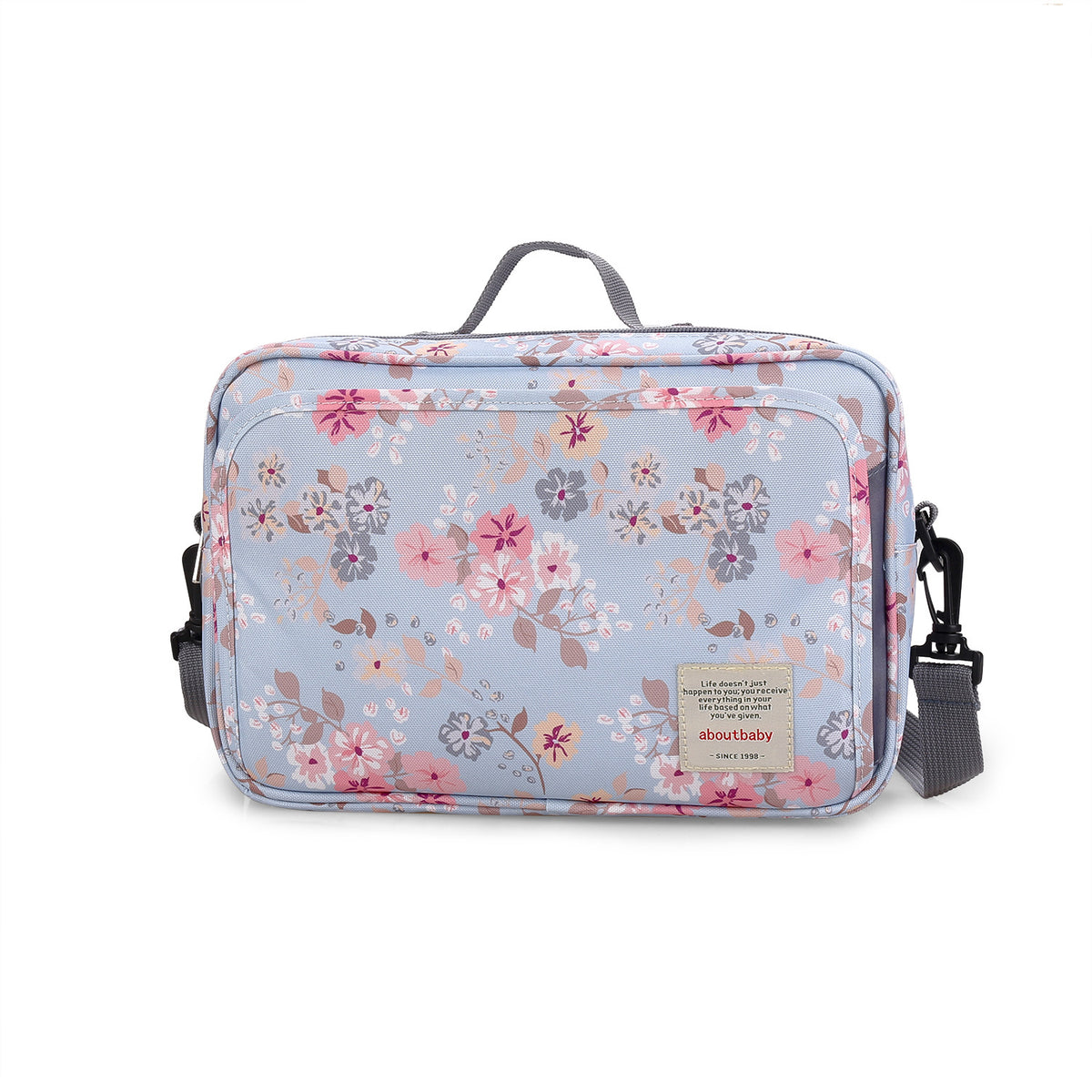 Cozy Cub portable diaper storage mommy bag in nursery with baby outing organizer and multiple compartments for baby essentials.