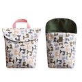 Grey Cozy Cub nursery diaper storage bag with fox design, portable organizer for on-the-go parents and baby essentials.