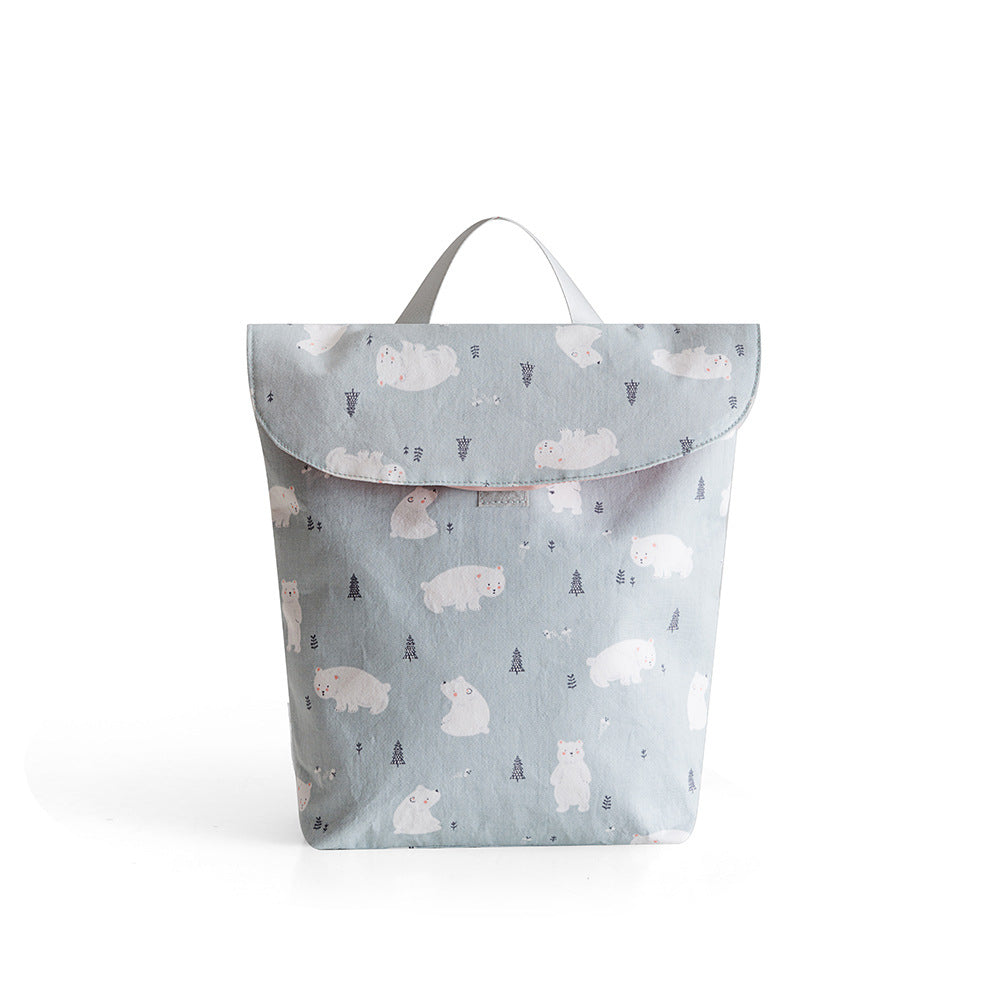 Cozy Cub nursery grey baby diaper storage bag with cute fox print, portable organizer for on-the-go parents and nursery organization.