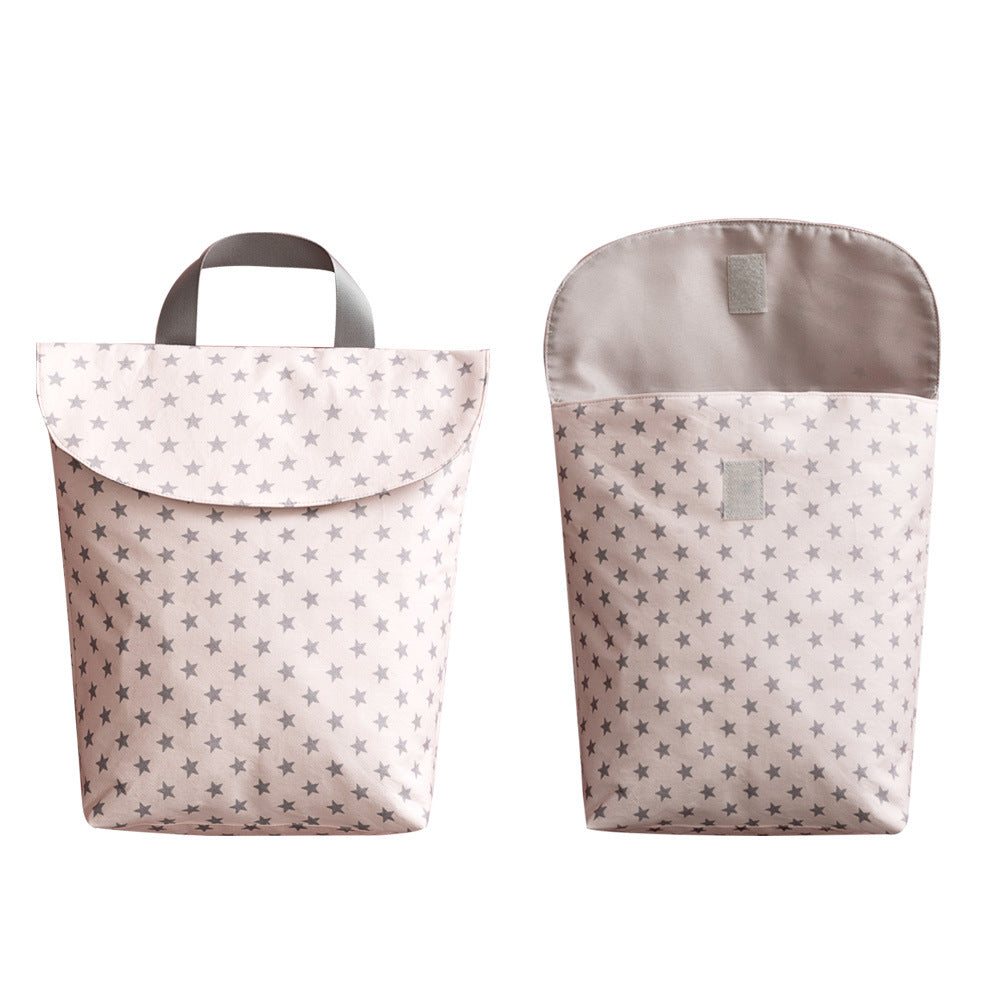 Cozy Cub baby diaper storage bag in grey with a fox design, portable nursery organizer for on-the-go parents.