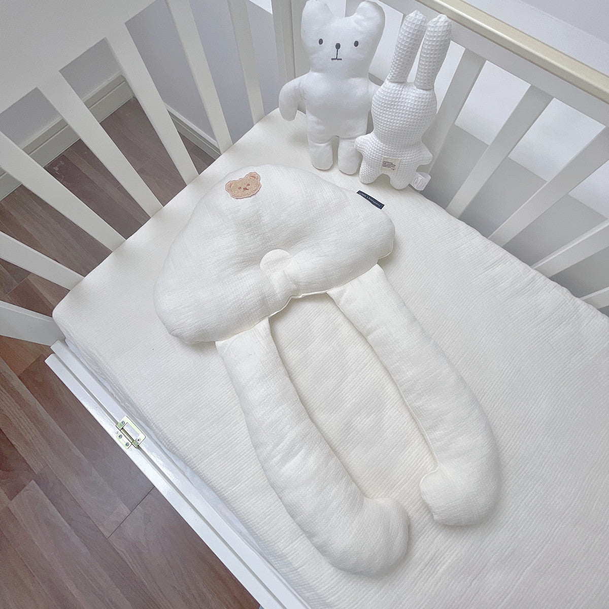 Cozy Cub baby soothing pillow set made of soft cotton, designed for infant sleep comfort, featuring a gentle bear theme.