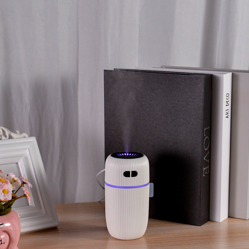 Cozy Cub Baby White Noise Humidifier, a white sleep aid device for newborns, emitting soothing noise to promote restful sleep.