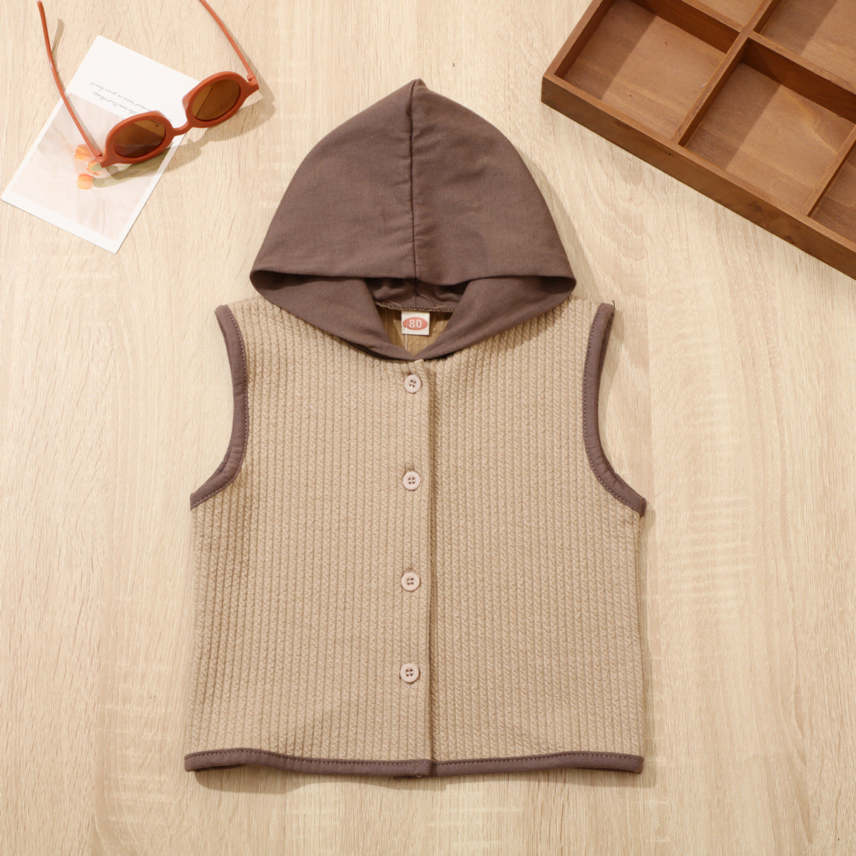 Apricot Cozy Cub baby hooded sleeveless jacket by eprolo, trendy infant cardigan vest with soft fabric and hood for warmth.