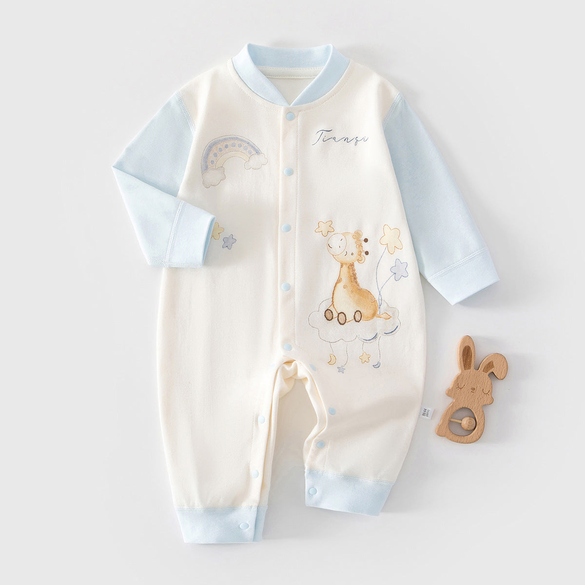 Unisex baby romper by eprolo featuring rainbow giraffe print, made of pure cotton, perfect for everyday wear.