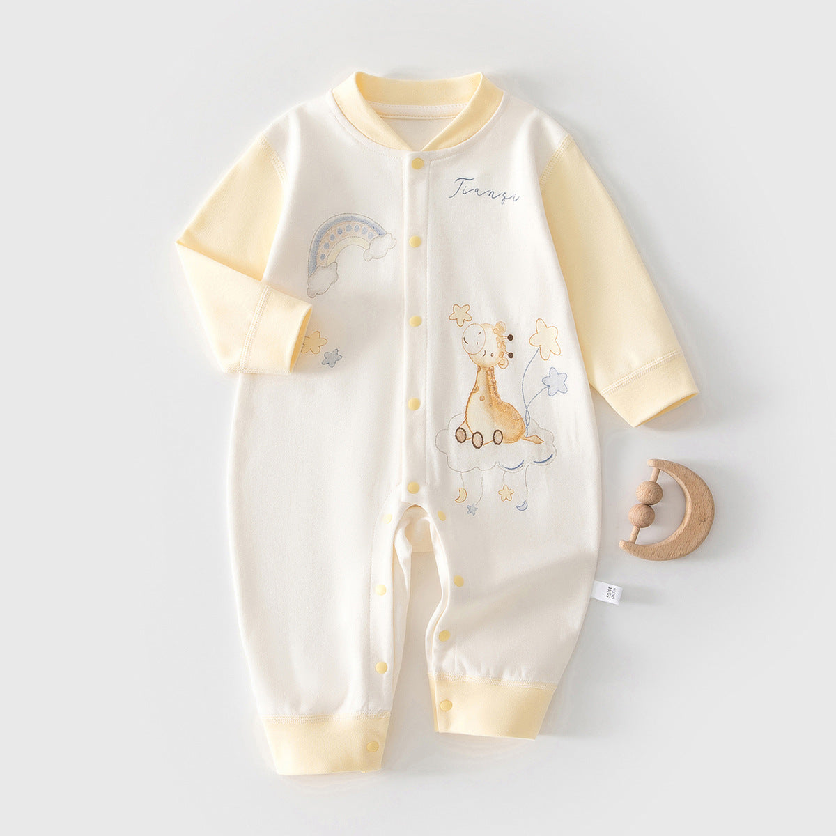 Unisex blue cotton baby romper with rainbow giraffe print, cozy eprolo baby onesie for everyday wear.