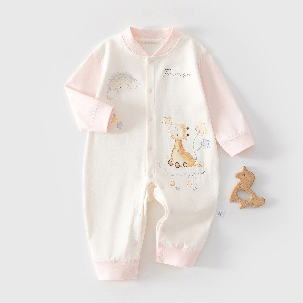 Unisex Cozy Cub Baby pure cotton romper featuring rainbow giraffe print, soft blue fabric, ideal for everyday wear