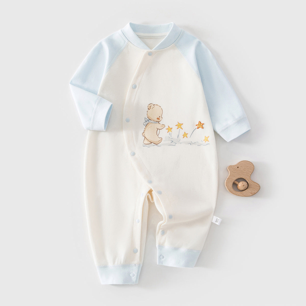 Unisex blue cotton baby romper with rainbow giraffe print, cozy eprolo Cozy Cub baby onesie for everyday wear.